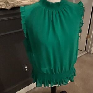 Beautiful emerald green sleeveless blouse. Size 8
